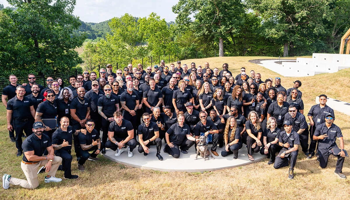 UHP graduates posing for a group photo on the UHP campus.